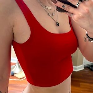 Comfy and stretchy red tank crop top scoop line is a  basics staple from akira